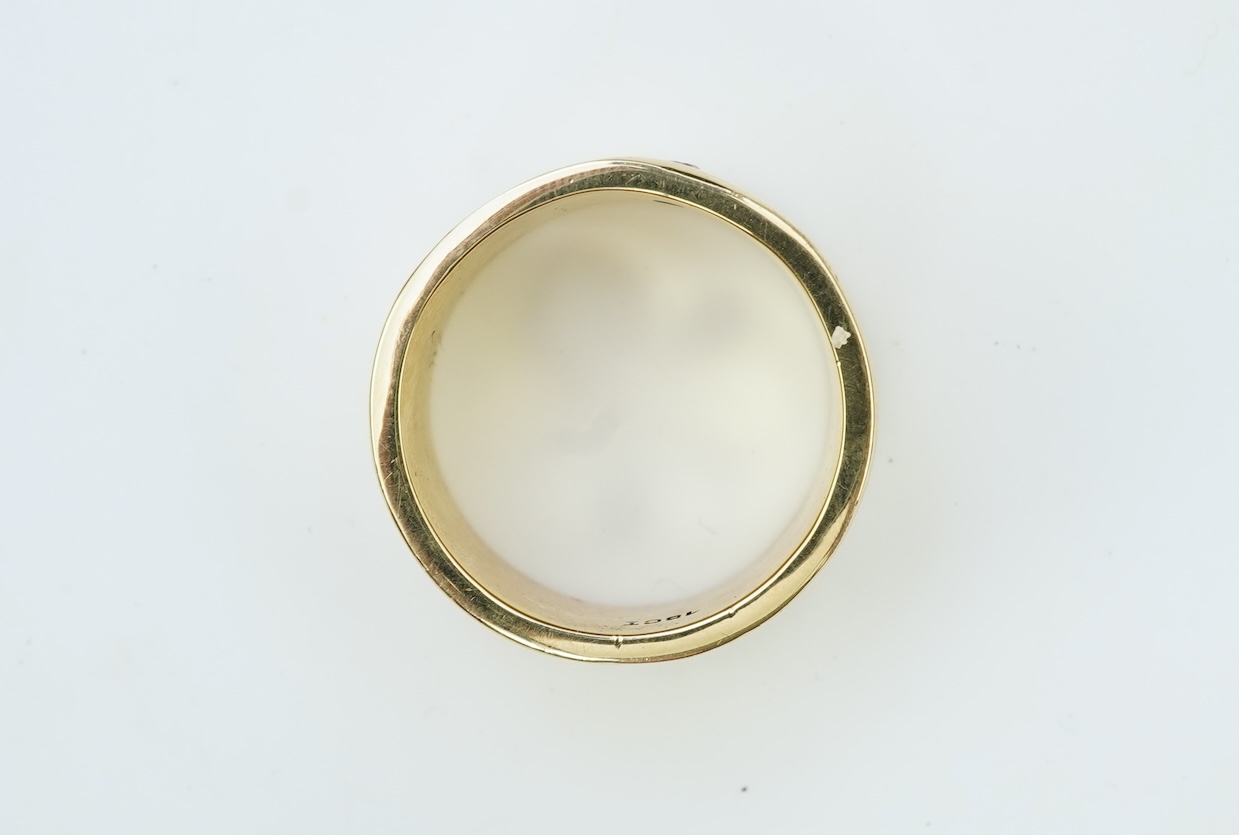 A gold and diamond ring